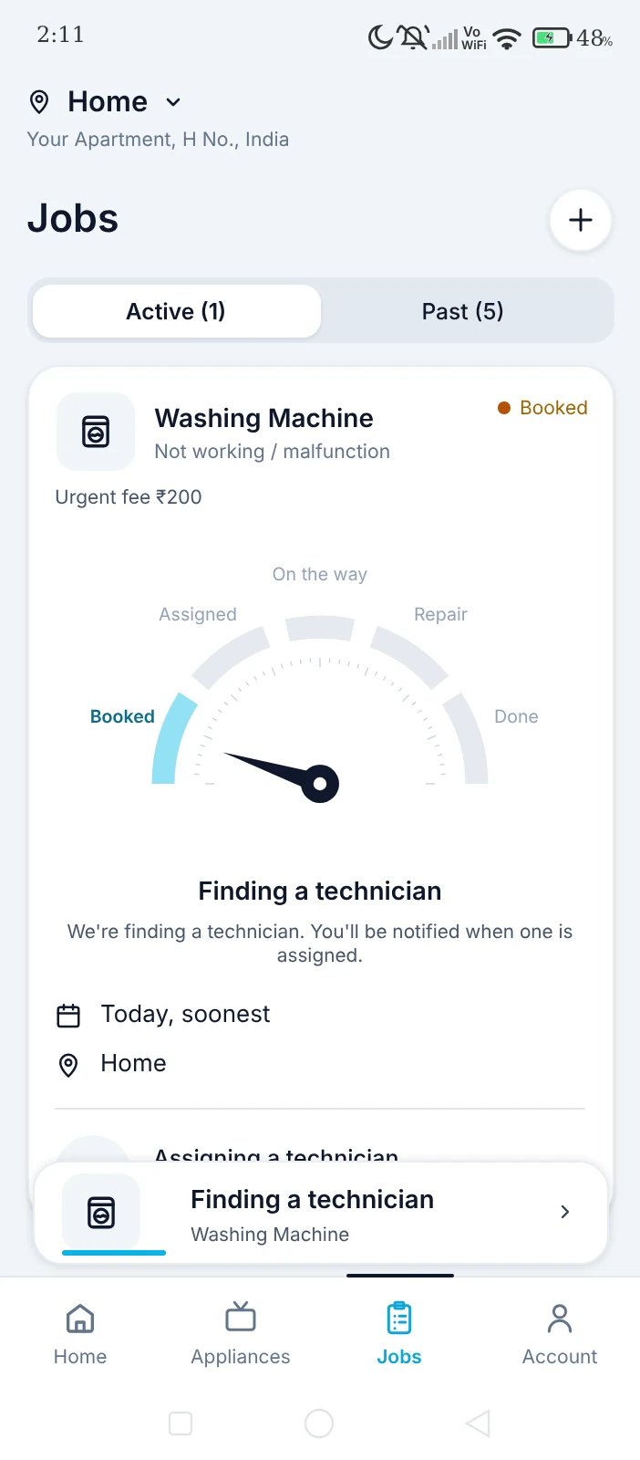 EveryWare app jobs screen showing a booked washing machine repair while a technician is being found